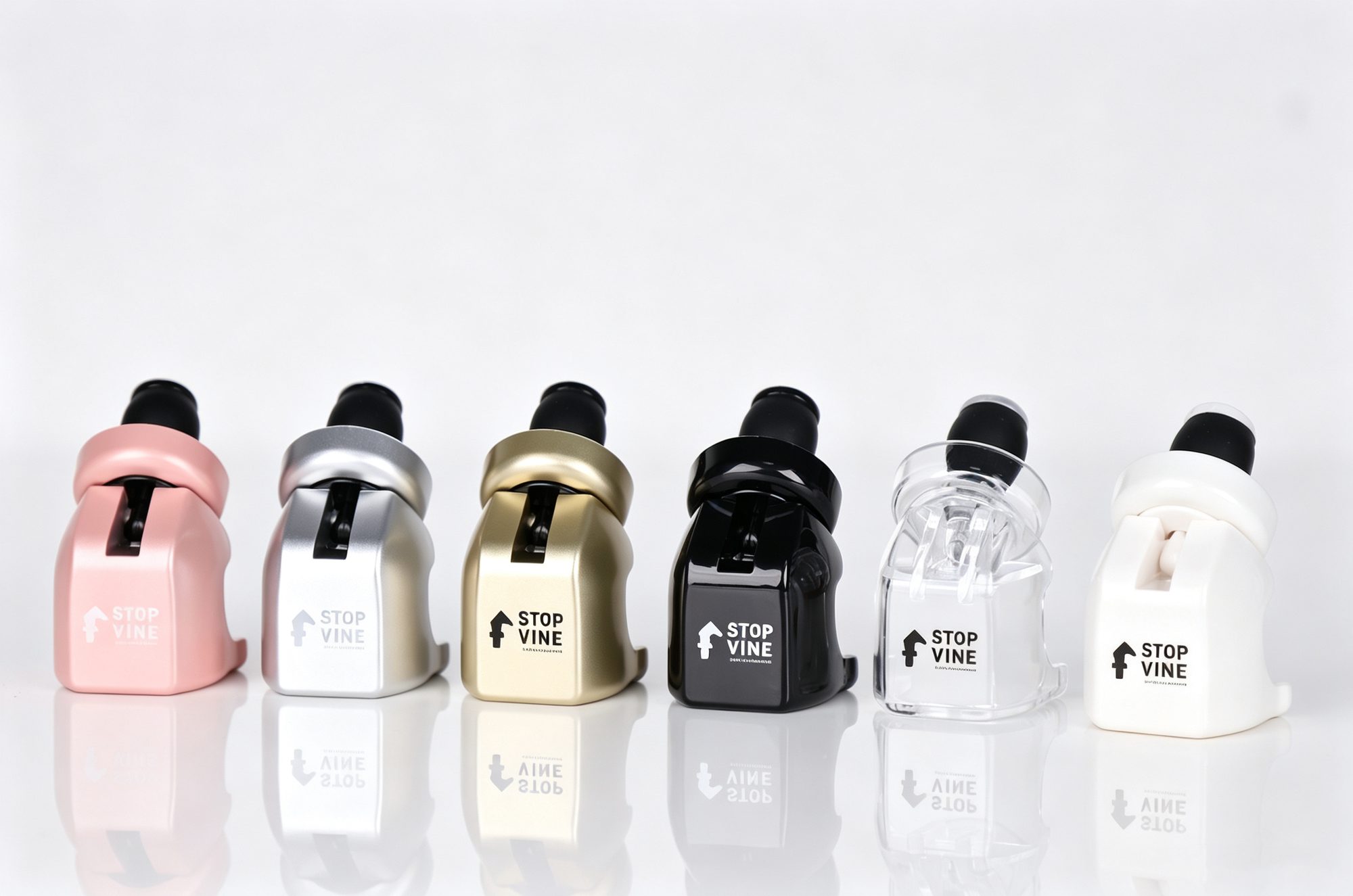 Bouchons stopper champagne SPARK 3 : les six finitions rose, argent, or, noir, cristal et blanc, posées côte à côte